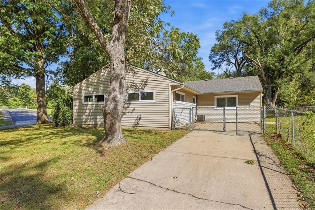 Big backyard, fenced yard and chain-link fence at 11235 Bristol Terrace, Kansas City, MO 64134