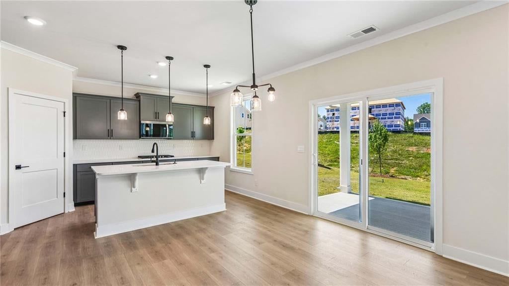 Open floor plan and breakfast nook at 16798 S Loiret Street, Olathe, KS 66062