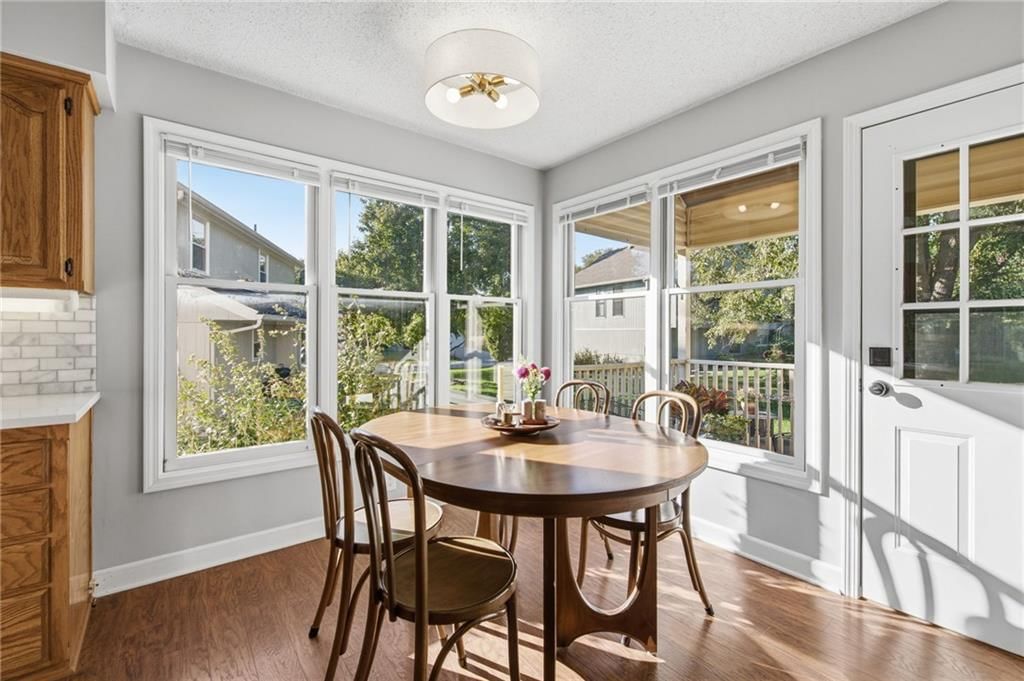 Covered patio, wall of windows and breakfast nook at 11212 W 115TH Street, Overland Park, KS 66210