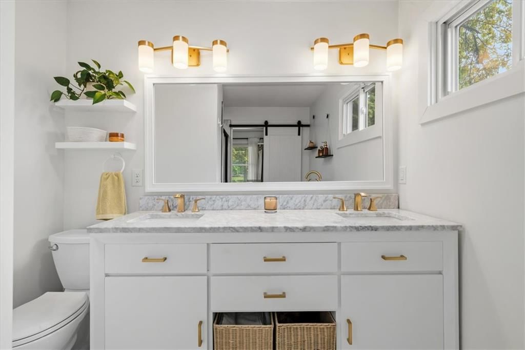 Double vanity and white vanity at 8601 Belleview Avenue, Kansas City, MO 64114