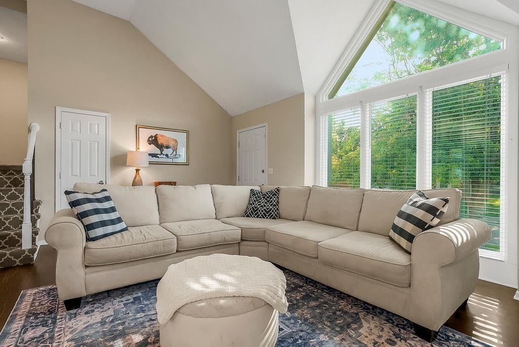 Tall ceilings, wall of windows and white trim at 4732 Chouteau Street, Shawnee, KS 66226