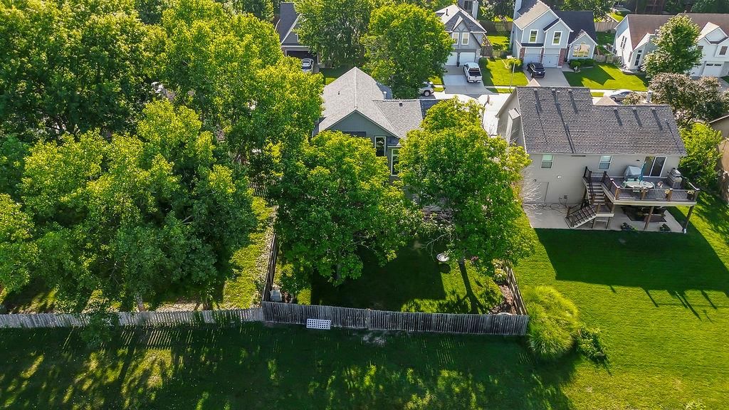 Big backyard, mature trees and flat lot at 4732 Chouteau Street, Shawnee, KS 66226