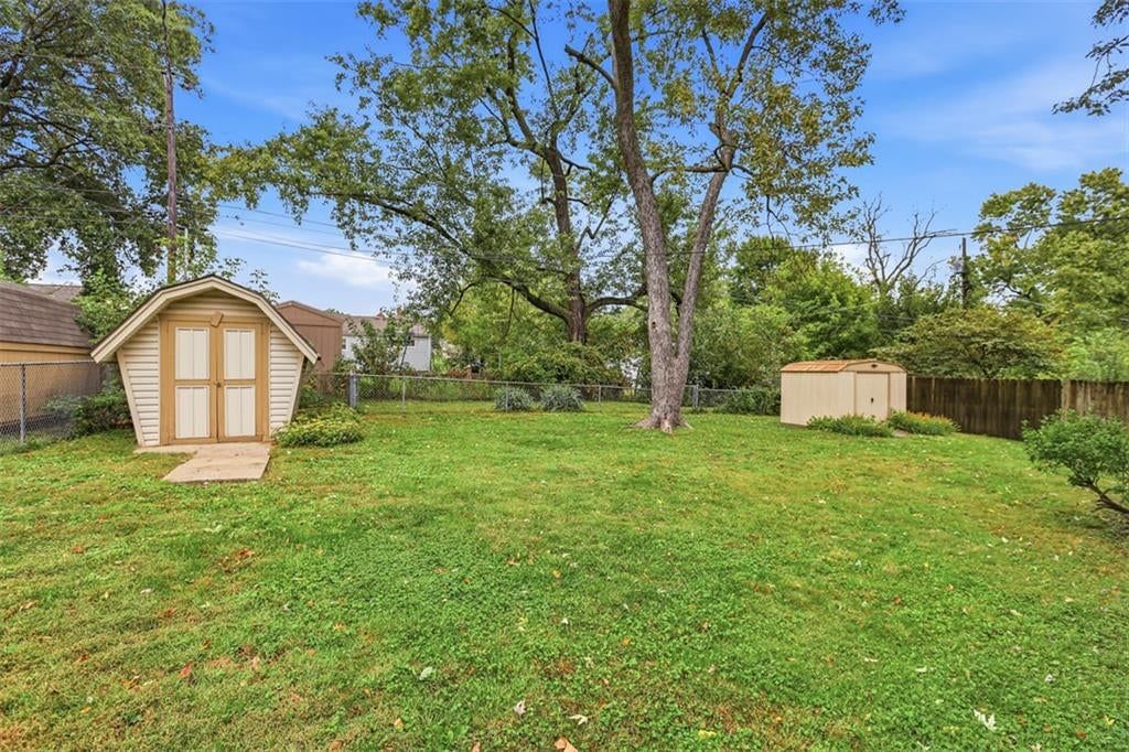 Big backyard, mature trees and flat lot at 6920 W 72nd Terrace, Overland Park, KS 66204