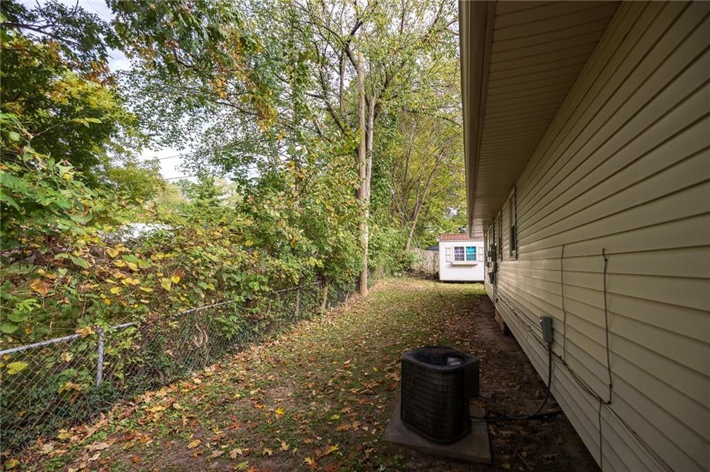 Fenced yard and chain-link fence at 5444 N Cypress Avenue, Kansas City, MO 64119