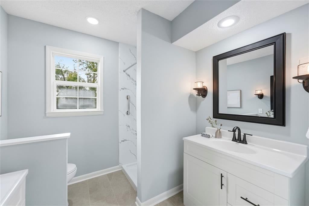 Renovated bathrooms at 5416 NE Circle Drive, Kansas City, MO 64119