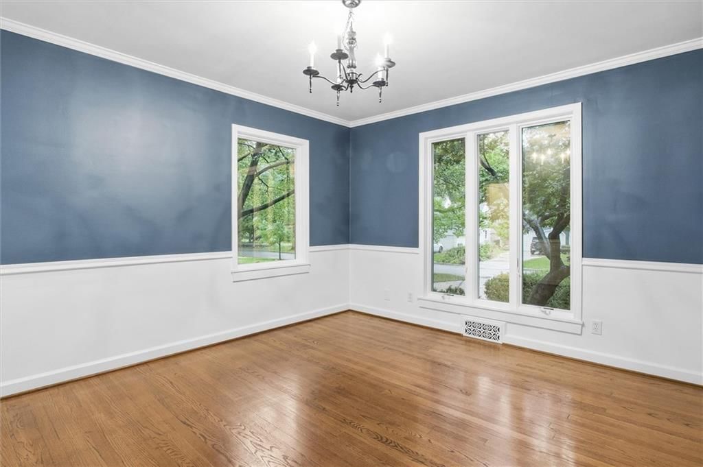 Statement lighting, wainscoting or board and batten and accent wall at 4124 Brookridge Drive, Fairway, KS 66205