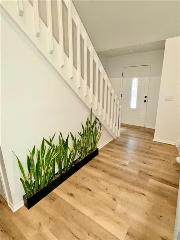 Staircase and wood stair railing at 12100 59 Street, Kansas City, MO 64133