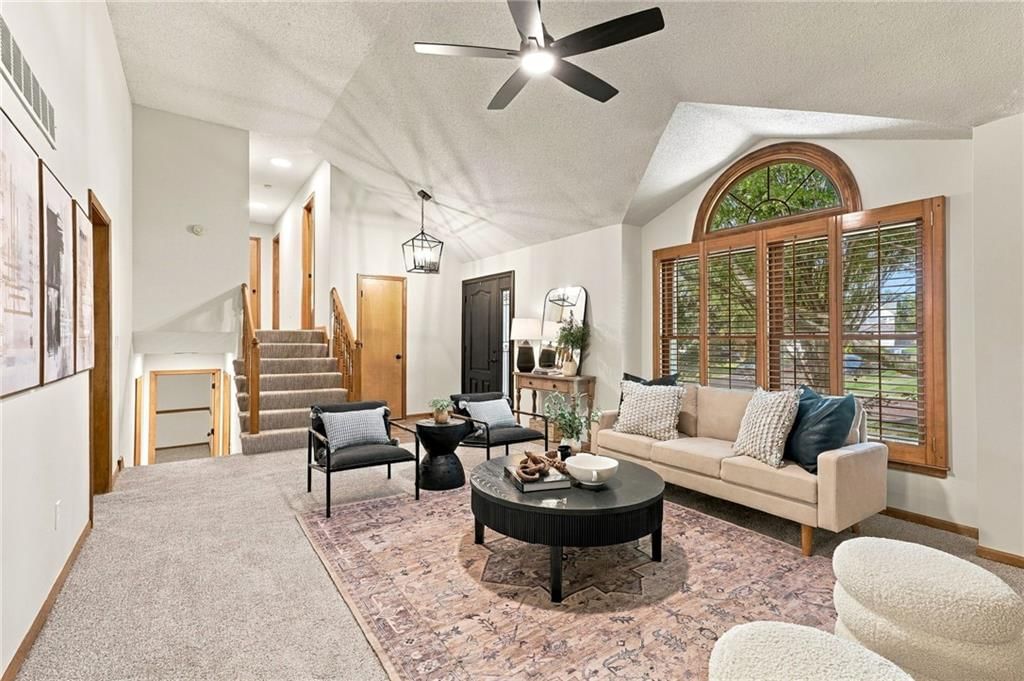 Staircase and wood stair railing at 15205 Lamar Avenue, Overland Park, KS 66223