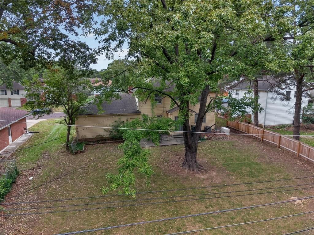 Big backyard, fenced yard and flat lot at 5701 W 97th Terrace, Overland Park, KS 66207