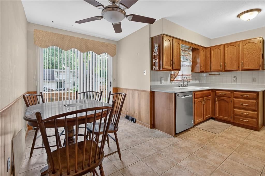 Tile floors and breakfast nook at 5701 W 97th Terrace, Overland Park, KS 66207