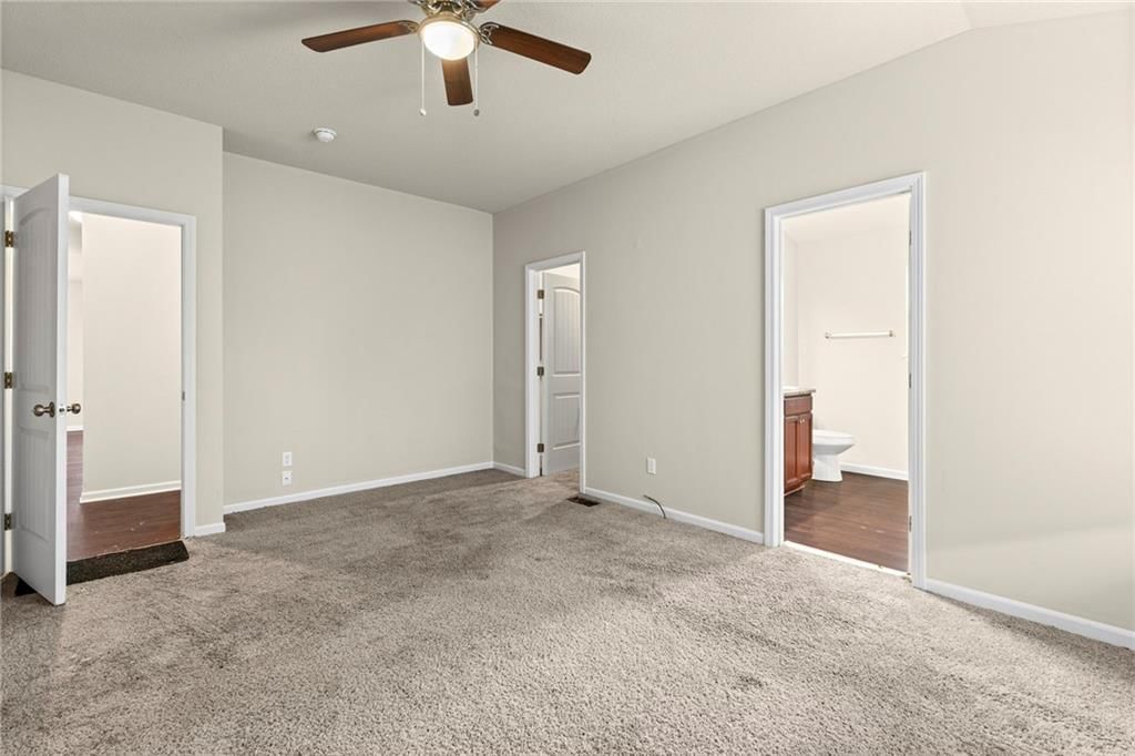 Main-floor primary bedroom at 31863 W 172nd Street, Gardner, KS 66030