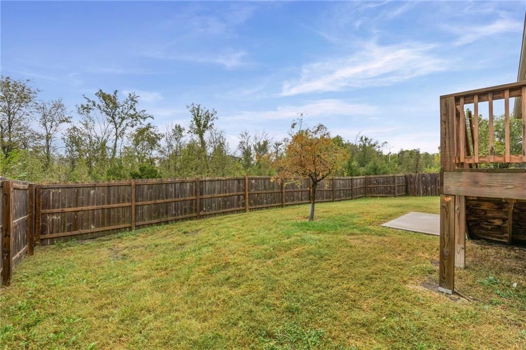 Deck, fenced yard and wood fence at 31863 W 172nd Street, Gardner, KS 66030