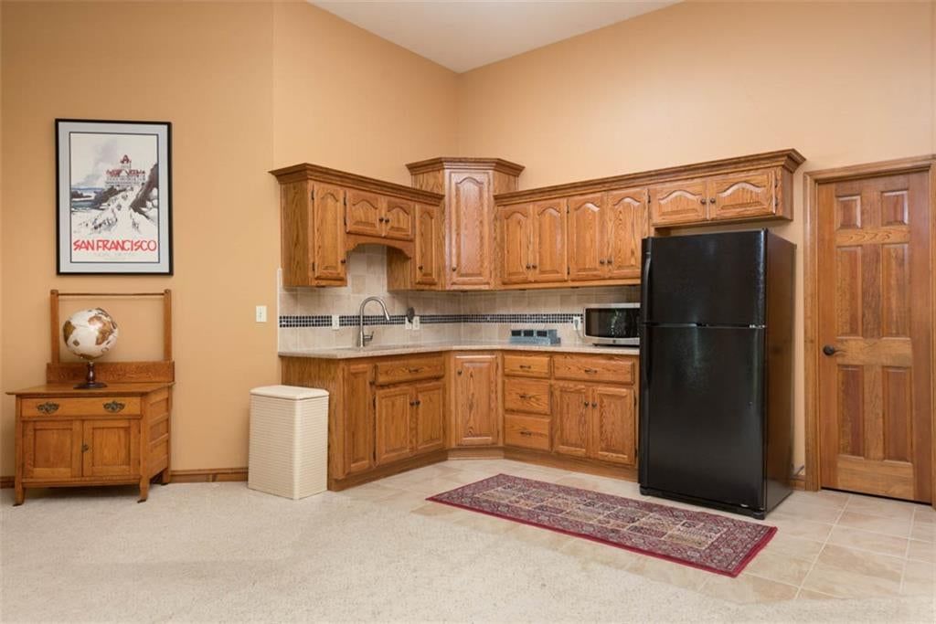 Second kitchen at 719 White Oak Lane, Gladstone, MO 64116