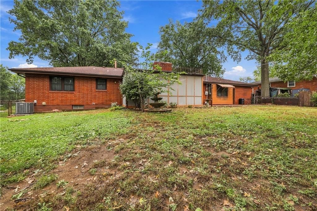 Big backyard, mature trees and flat lot at 1703 NE 77 Street, Gladstone, MO 64118