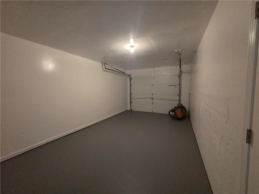 Attached garage at 909 N JAN MAR Street, Olathe, KS 66061