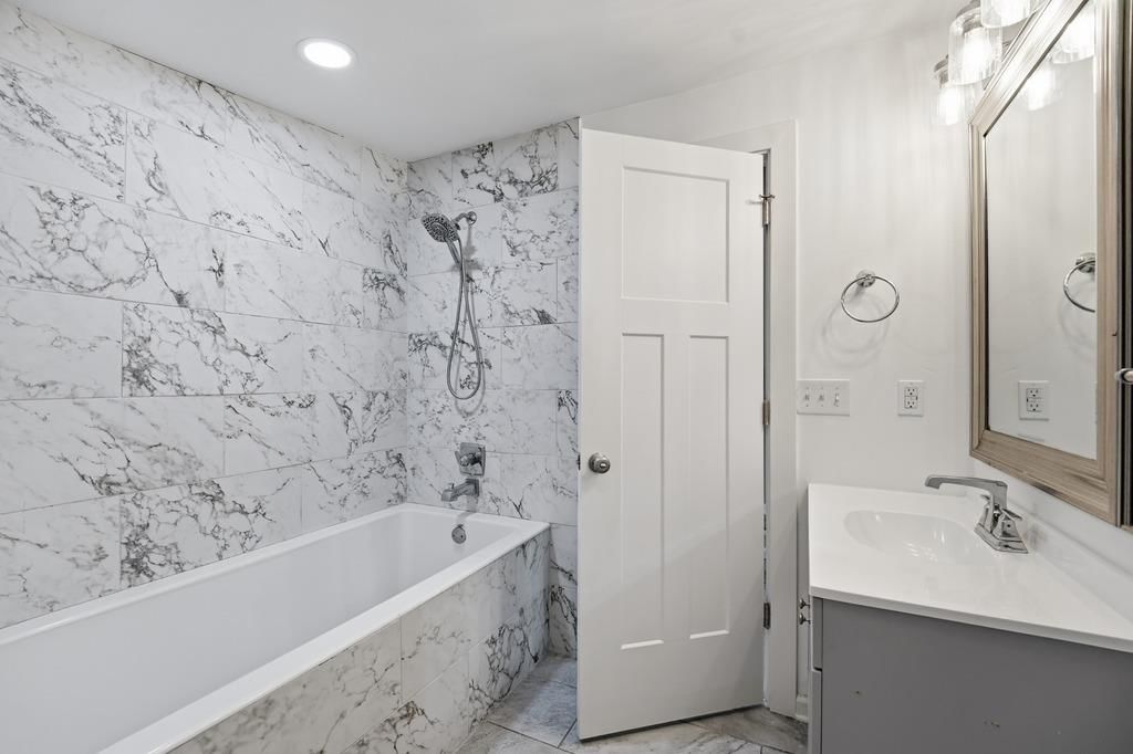 Tiled shower at 4920 Birch Street, Roeland Park, KS 66205
