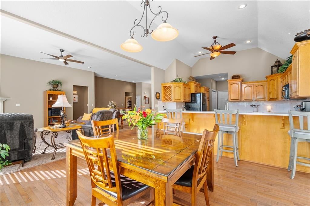 Kitchen island and recessed lighting at 207 Peach Tree Avenue, Lone Jack, MO 64070