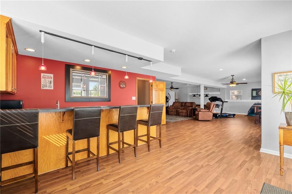 Finished basement and wet bar at 207 Peach Tree Avenue, Lone Jack, MO 64070