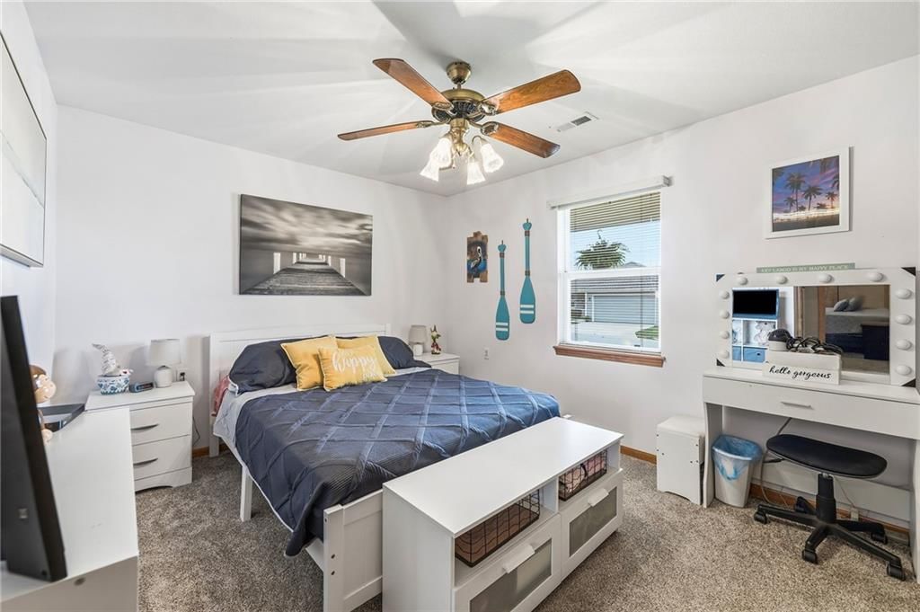 Photo 21 of 26 - 516 SATURN Drive, Raymore, MO 64083