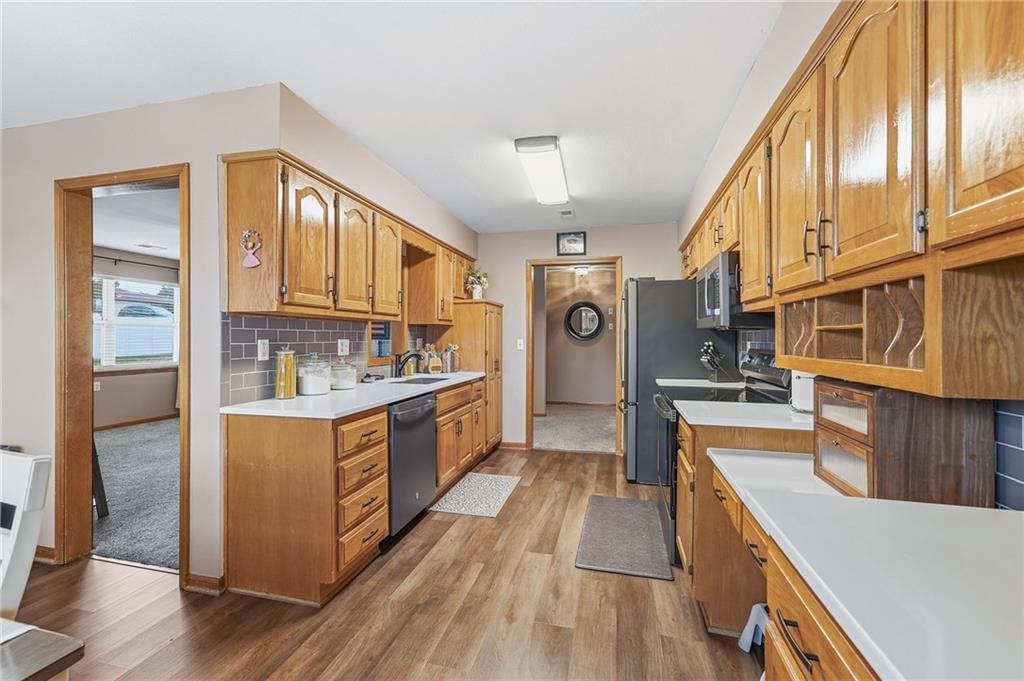 Photo 7 of 26 - 516 SATURN Drive, Raymore, MO 64083