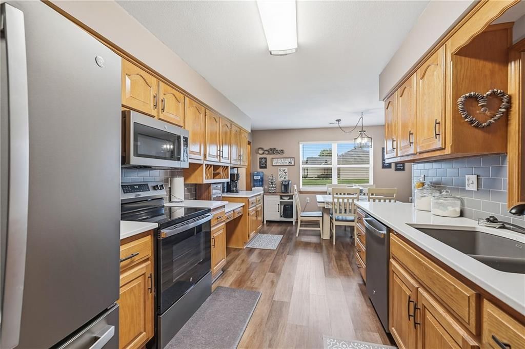 Photo 4 of 26 - 516 SATURN Drive, Raymore, MO 64083