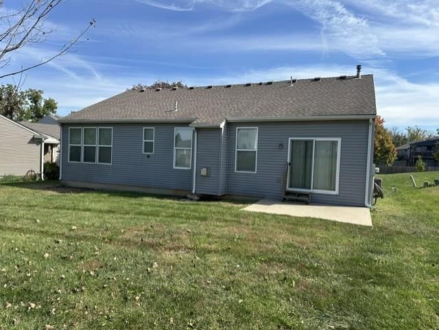Concrete patio and flat lot at 7904 Poplar Court N, Kansas City, MO 64119