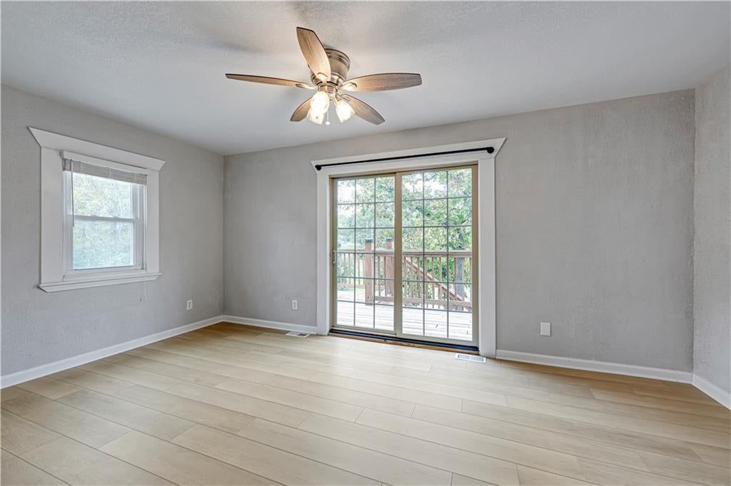 Wall of windows at 165 T Street, Lake Lotawana, MO 64086