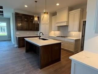 Kitchen island, two-tone kitchen cabinets and kitchen backsplash at 3347 SW Arborun Drive, Lee's Summit, MO 64082