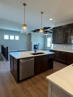 Open floor plan and stainless steel appliances at 3347 SW Arborun Drive, Lee's Summit, MO 64082