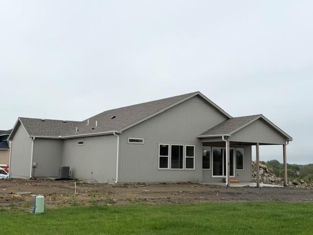 Covered patio and flat lot at 3347 SW Arborun Drive, Lee's Summit, MO 64082