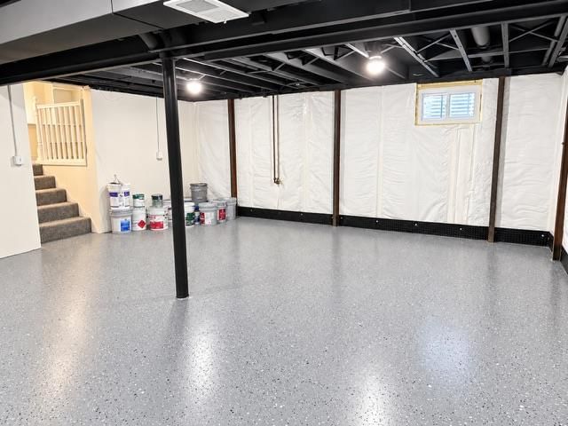 Finished basement, epoxy garage floor and staircase at 7503 E 93rd Street, Kansas City, MO 64138