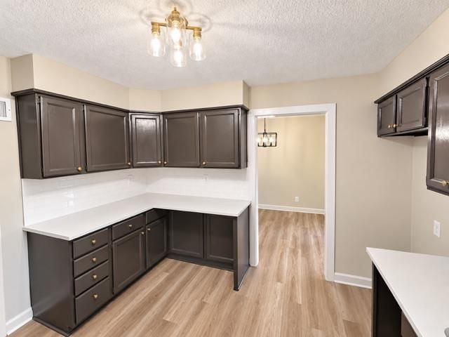 Kitchen backsplash, subway tile backsplash and white countertops at 7503 E 93rd Street, Kansas City, MO 64138