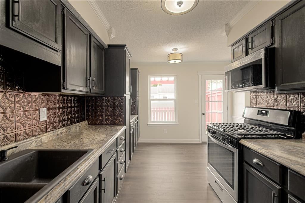 Photo 4 of 29 - 6616 E 128th Street, Grandview, MO 64030