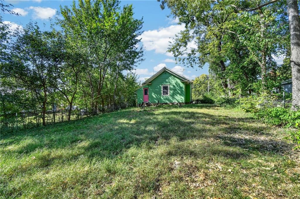 Fenced yard, mature trees and flat lot at 4013 Springfield Street, Kansas City, KS 66103