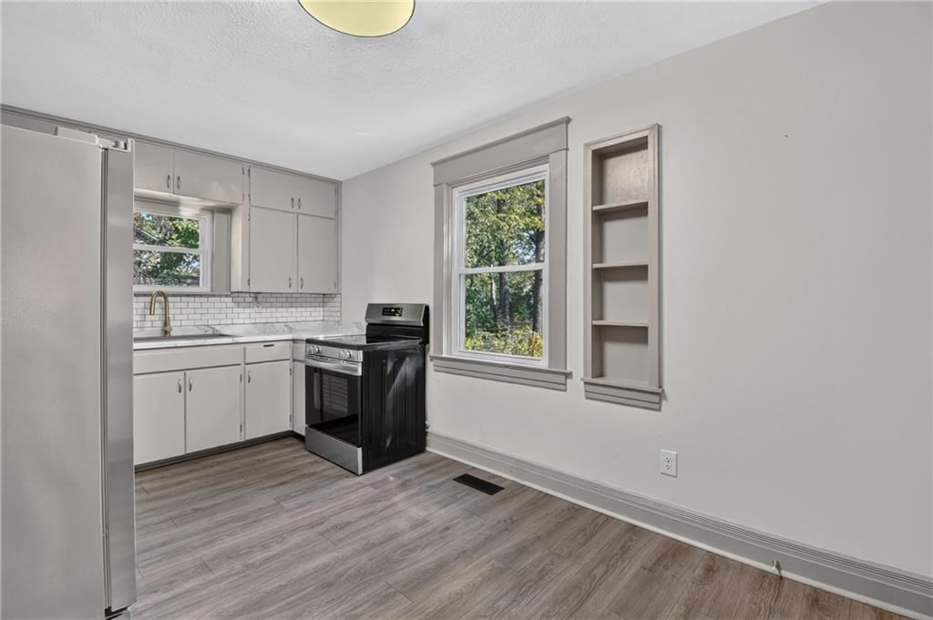 Updated kitchen and kitchen backsplash at 4013 Springfield Street, Kansas City, KS 66103