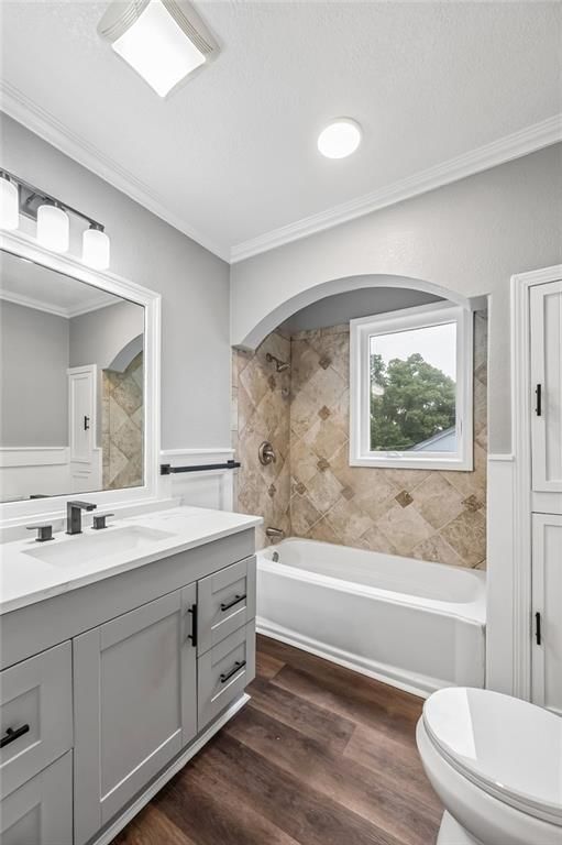 Tiled shower, double vanity and gray vanity at 1514 N 51st Street, Kansas City, KS 66102