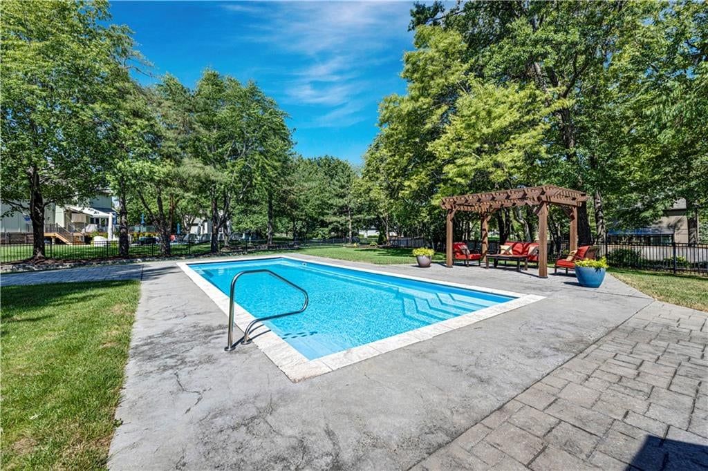 Pergola, paver patio and concrete patio at 9410 141st Street, Overland Park, KS 66221