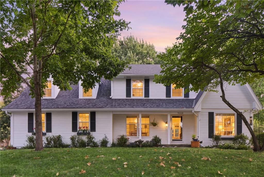 Mature trees, gray roof and asphalt shingle roof at 9320 W 113th Street, Overland Park, KS 66210