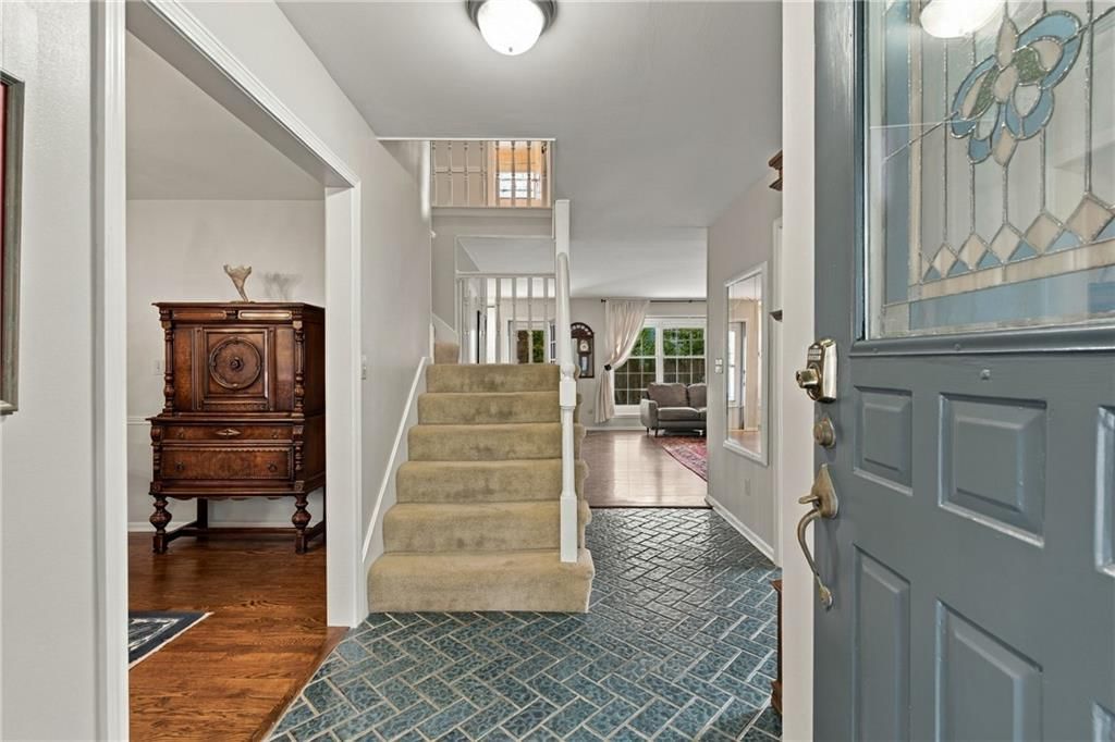 Staircase and wood stair railing at 9320 W 113th Street, Overland Park, KS 66210