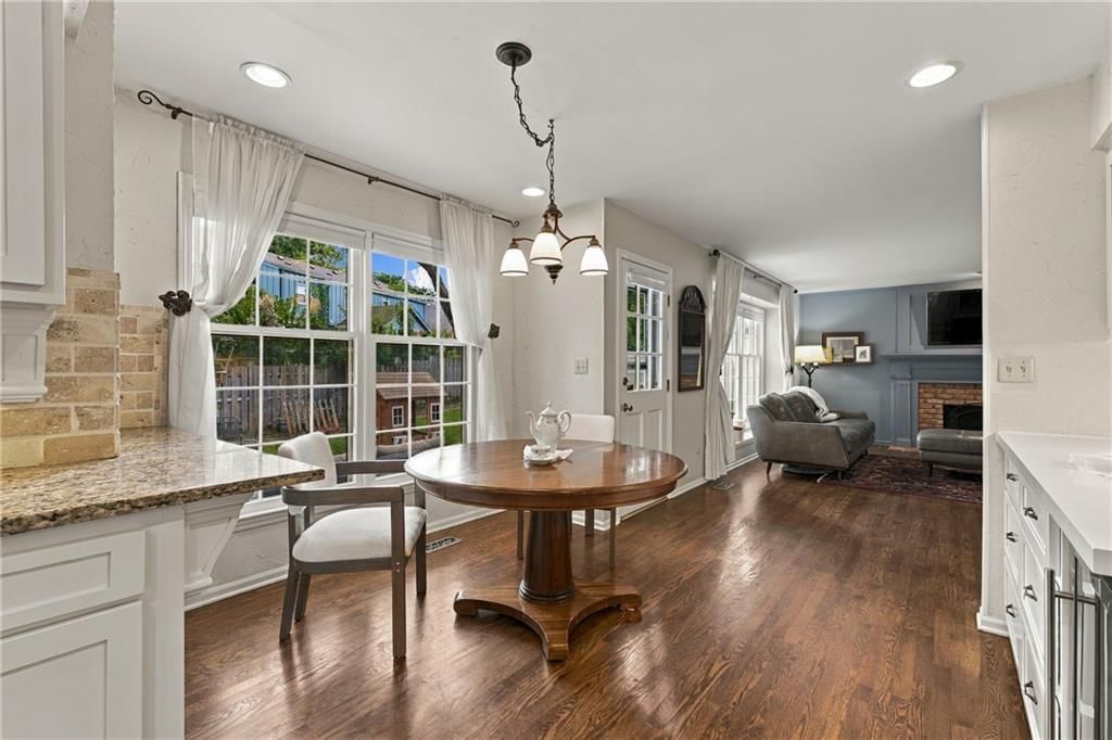 Open floor plan, butler's pantry and breakfast nook at 9320 W 113th Street, Overland Park, KS 66210