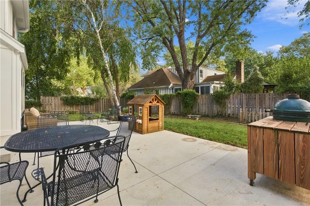 Big backyard, fenced yard and wood fence at 9320 W 113th Street, Overland Park, KS 66210