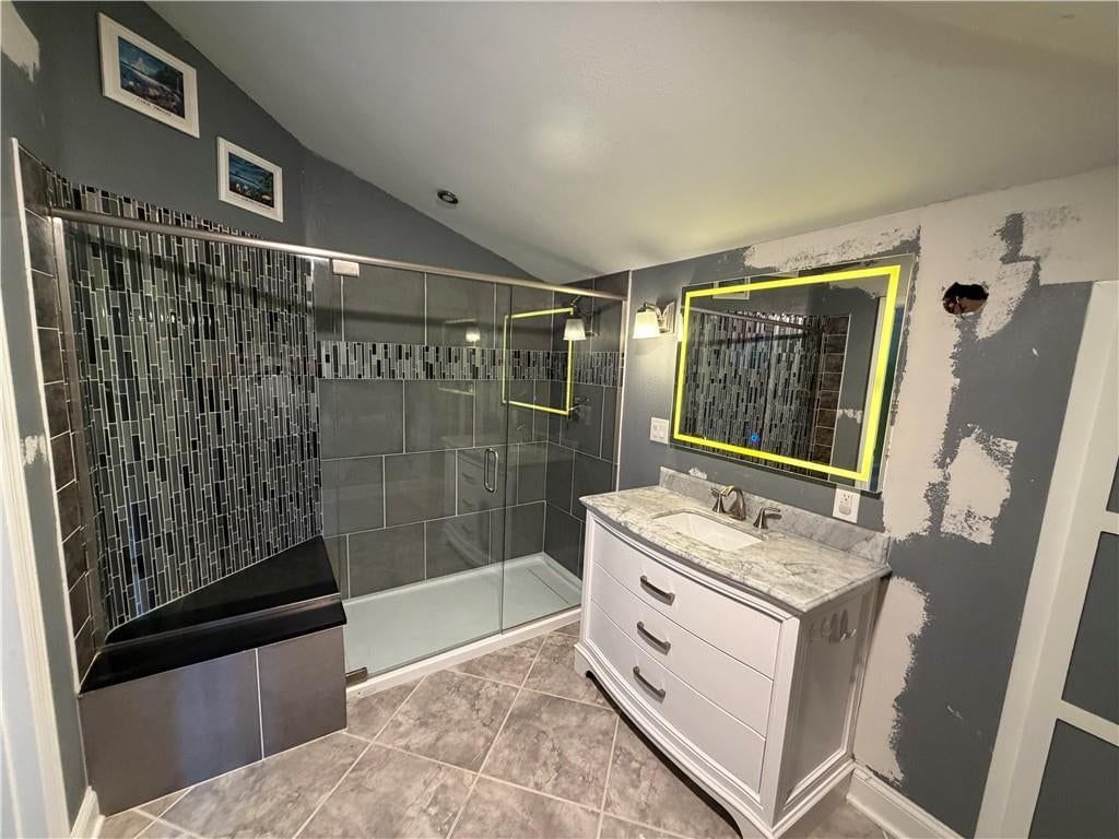 Double vanity and white vanity at 209 Renee Lane, Garden City, MO 64747