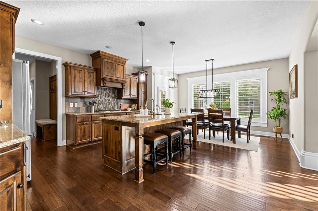 Statement lighting and breakfast nook at 9411 W 163rd Terrace, Overland Park, KS 66085
