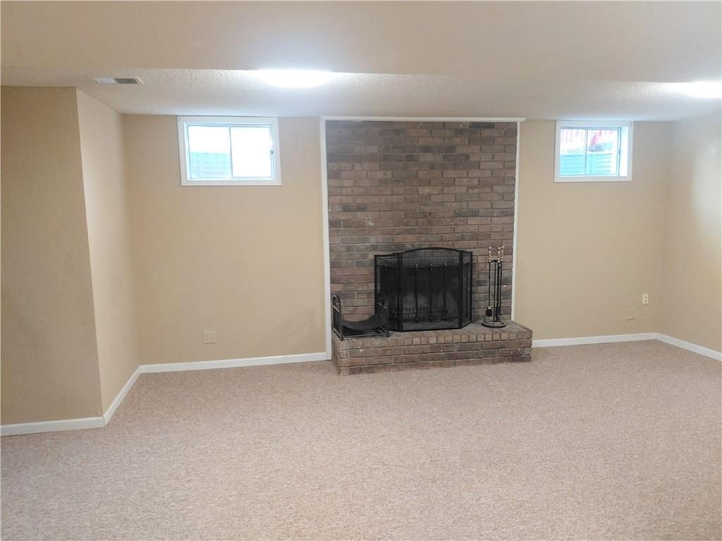 Finished basement at 10010 James A Reed Road, Kansas City, MO 64134