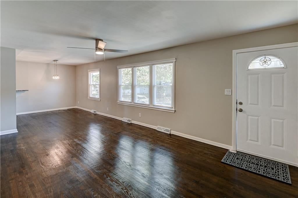 Hardwood floors and white trim at 2708 S Glenwood Avenue, Independence, MO 64052