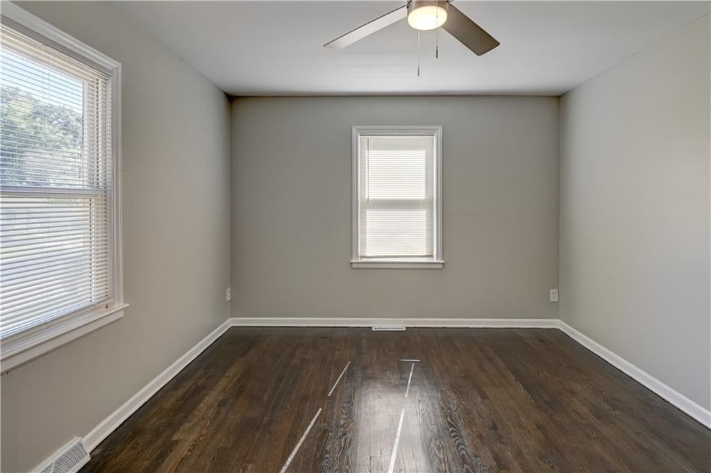 Main-floor primary bedroom at 2708 S Glenwood Avenue, Independence, MO 64052