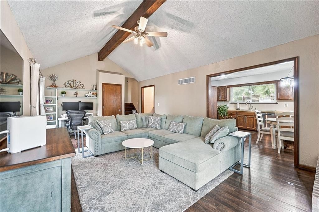 Tall ceilings, open floor plan and ceiling beams at 14315 W 65th Street, Shawnee, KS 66216