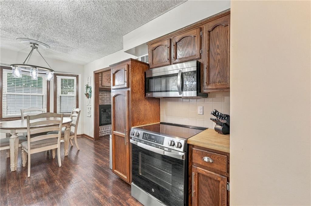 Breakfast nook and electric range at 14315 W 65th Street, Shawnee, KS 66216