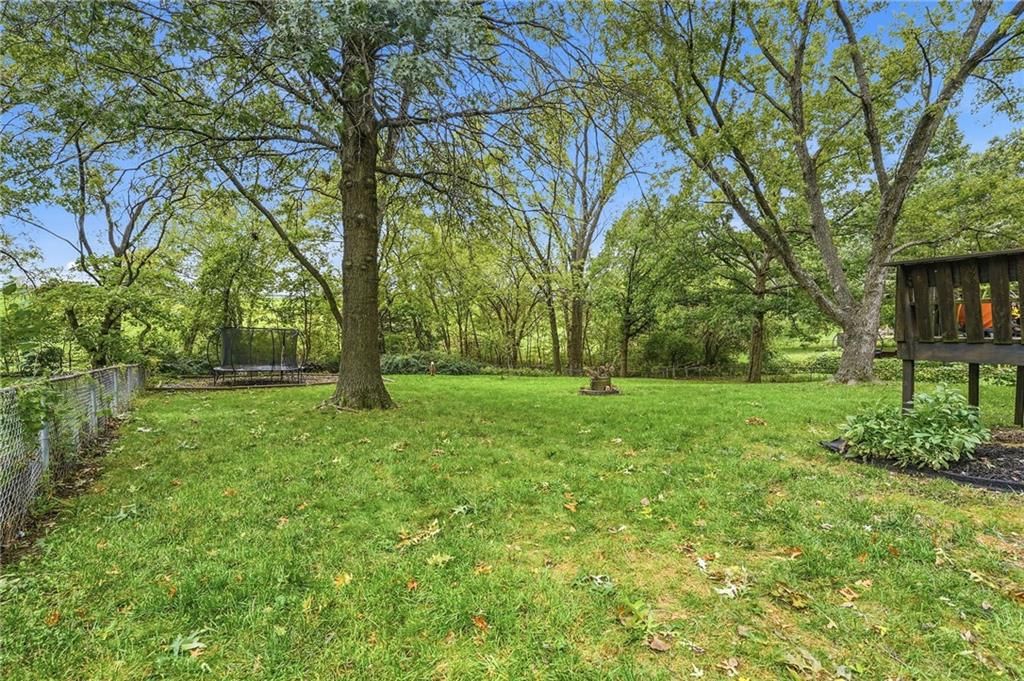 Fenced yard and mixed fence at 14315 W 65th Street, Shawnee, KS 66216