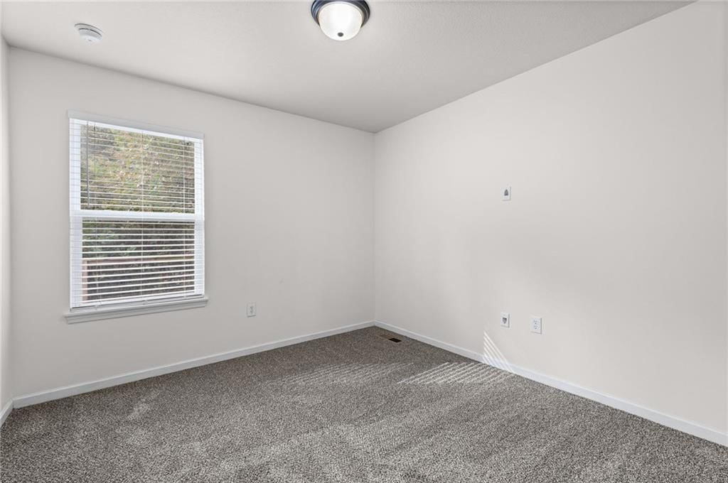 Tile floors and black hardware at 3305 NW 87th Street, Kansas City, MO 64154